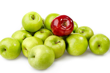 red apple between green apples