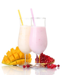 Milk shakes with fruits isolated on white