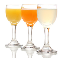 Tropical juices in glasses isolated on white