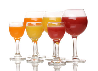 Tropical juices in glasses isolated on white