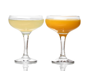 Tropical juices in glasses isolated on white