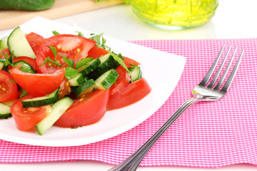 Fresh salad with tomatoes and cucumbers