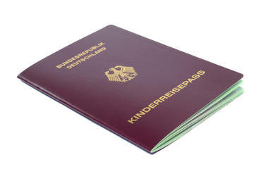 A German passport for a child closed on white background