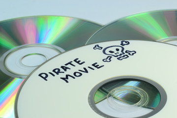 Piracy concept with Pirate Movie written on a dvd