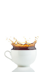 Splash of coffee in white cup