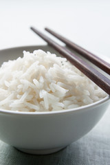 Long grain rice bowl with chopsticks