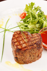 Grilled steak with sauce