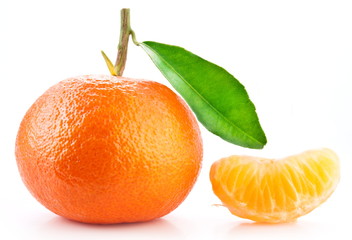 Tangerine and  its slice on white background.