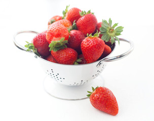 Strawberries in a white drushlake isolated background