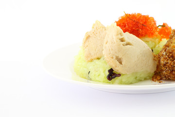 Egg custard on green sticky rice dish.
