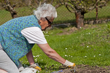 Fototapeta premium Senior Woman in Garden