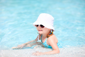 Little girl at swimming pool