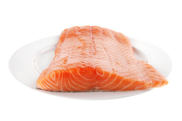salmon fillet on white plate
