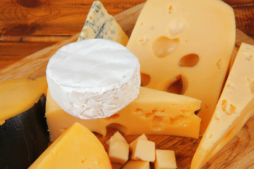cheeses on cutting board