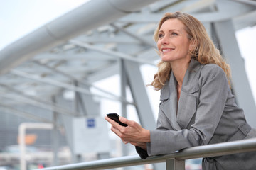 Businesswoman with mobile phone