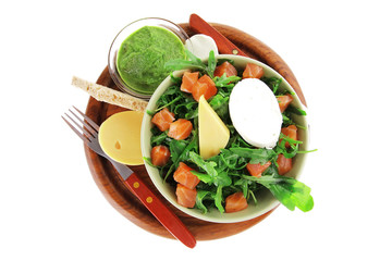 salad with salmon in green bowl