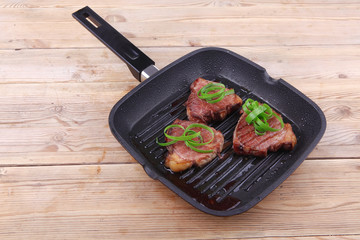 fillet strips on grill teflon black plate