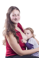 Little girl eating milk