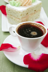 cake with whipped cream served with black coffee