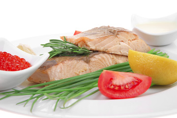 roasted salmon strips with red caviar and tomatoes