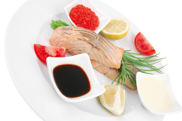 roasted salmon strips with red caviar and tomatoes