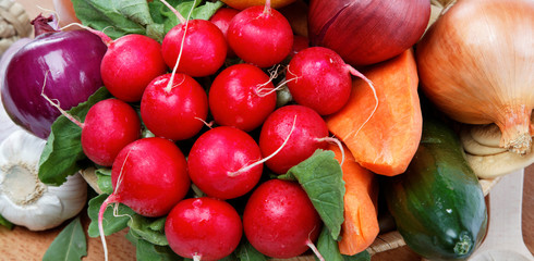 Healthy food. Fresh vegetables and fruits on a wooden board.