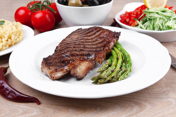 fillet with asparagus , pasta portion
