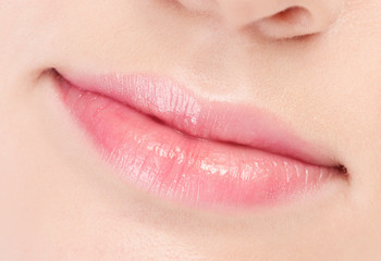 Fototapeta premium Close-up face of beauty young woman. Lips zone