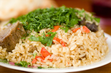 Piping hot pilau on a plate