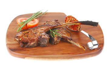 meat over wood: grlled ribs on plate