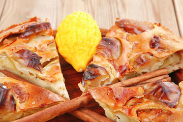 baked food : apple pie cuts and lemon