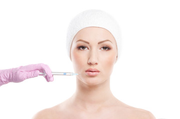 Portrait of a young woman on a botox injection procedure