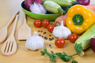 Fresh vegetables and kitchen utensils