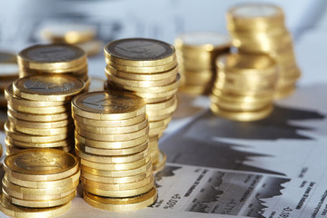Business diagram on financial report with coins