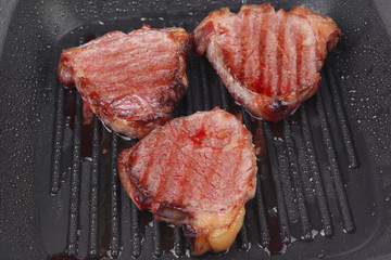 grilled bloody beef steaks