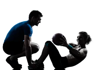 Foto op Plexiglas man woman exercising weights workout fitness ball © snaptitude