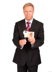 Mann mit Lupe und F&uuml;nzig Euro Schein