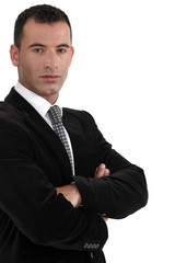 Businessman with his arms crossed