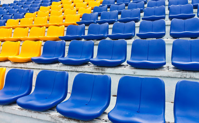 Empty plastic seats in a stadium