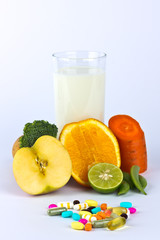 assorted fruit and vegetable and pills