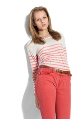 Beautiful woman standing against white background