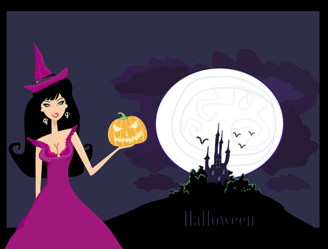 Halloween witch standing with pumpkin