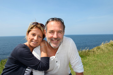 Cheerful senior couple relaxing on vacation