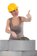 Bricklayer giving the thumb's up