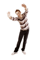 A young man, hands up isolated on white background