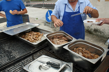 asty barbecued meat during a festivity with barbecue
