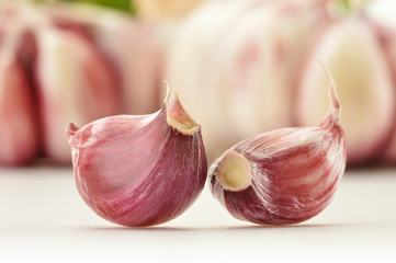 Fresh garlic with parsley isolated on white