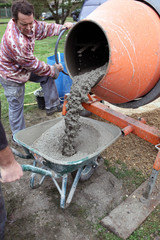 Man with a cement mixer