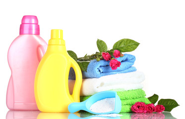 Obraz na płótnie Canvas Detergent with washing powder and towels isolated on white
