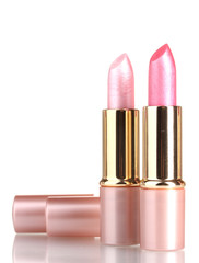 beautiful pink lipsticks isolated on white